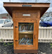 Little free library located in a garden. 